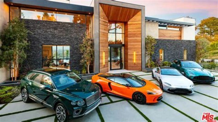 
Davido reacts as Asake splashes millions on mansion and car 